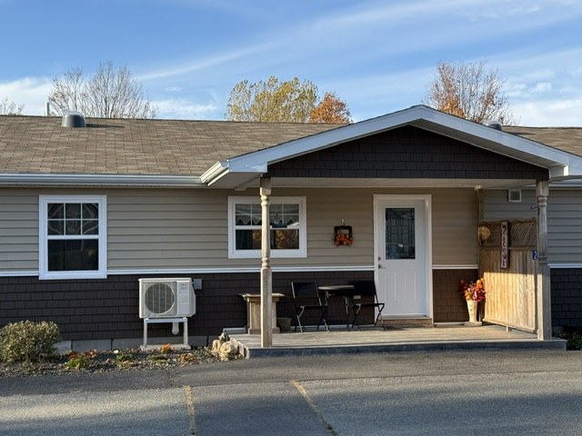 Covered front porch and entrance of a condo unit